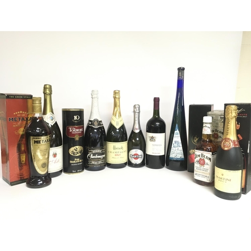 1956 - A collection of various spirits and wines including Martini Brut, Jim Bean Bourbon Whiskey, Pinot Gr... 