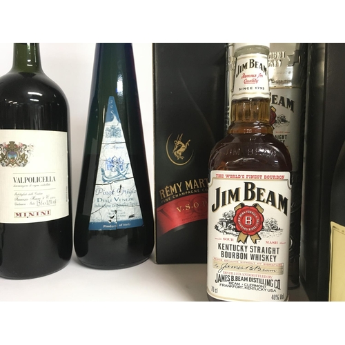 1956 - A collection of various spirits and wines including Martini Brut, Jim Bean Bourbon Whiskey, Pinot Gr... 