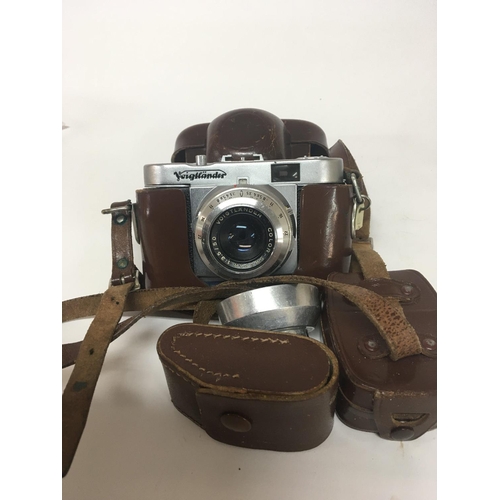 1969 - A Vintage Voigtlander Vito B camera in a fitted leather case.