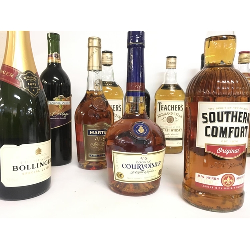 1971 - A collection of wines and spirits including Bombay Sapphire, Southern Comfort, Teachers Highland Cre... 