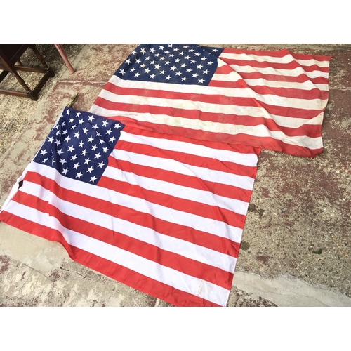 1972 - A pair of American flags, one with double a pole. Both flags approximately 142cm long