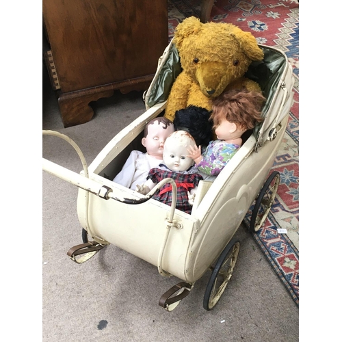 1978 - 1930s Wooden Dolls pram with cover and hood, Large Teddy and four dolls.