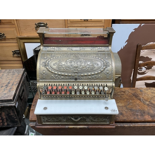 1991 - A 20th century American heavy brass National Cash Register. 43 x 40 x 43cm