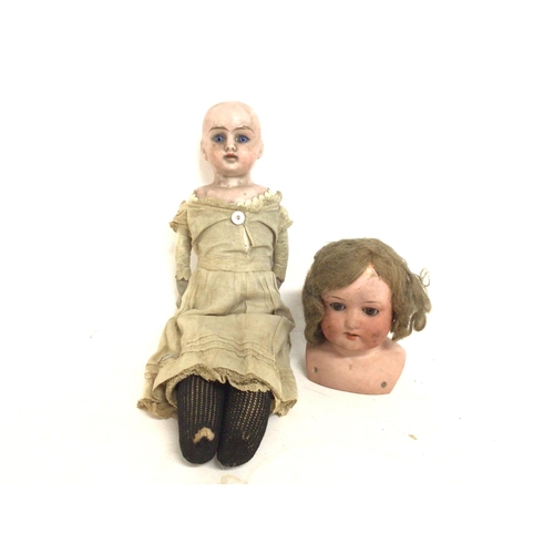 2000 - German Heubach Porcelain head (11cm tall) & leather body doll (33cm tall). Postage category B- NO RE... 