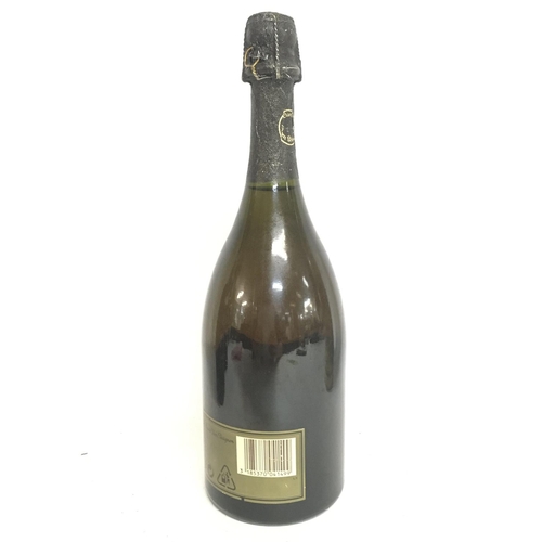 2039 - An unopened bottle of Cuvee Dom Perignon Champagne Millesime 1988. Postage category D