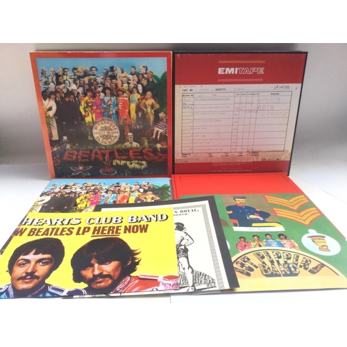 2058 - A Beatles 'Sgt Peppers' super deluxe 6 disc box set with lenticular sleeve, book and all inserts.- N... 