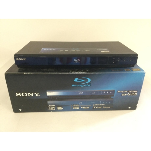 2061 - A boxed Sony blu-ray player and a boxed Toshiba 300w home theatre system (2). A boxed Sony blu-ray p... 