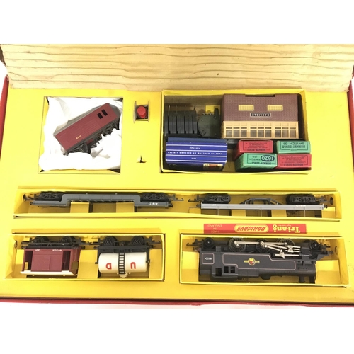 2092 - A collection of boxed Triang toys including electric model railway, station set, track and accessori... 