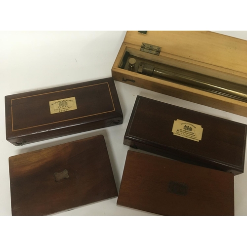 2098 - Three mahogany cased precision drawing sets. A large brass rolling ruler and two Sikes Hydrometer se... 