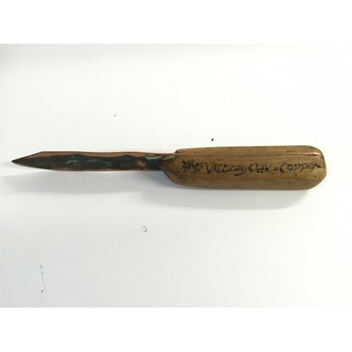 2128 - An oak and copper letter opener containing material from HMS Victory with a certificate provenance. ... 