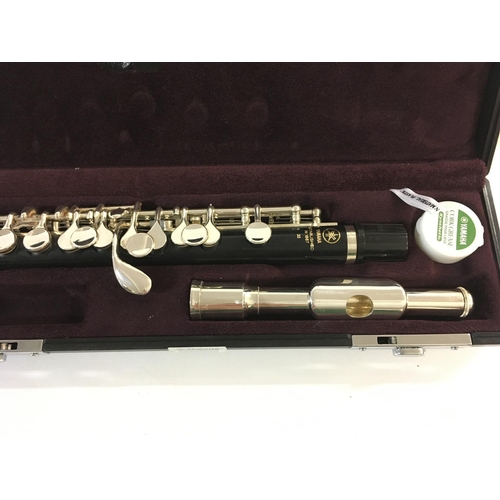 2129 - A cased Yamaha Piccolo model YPC-32. Appears new and unused. Postage B.