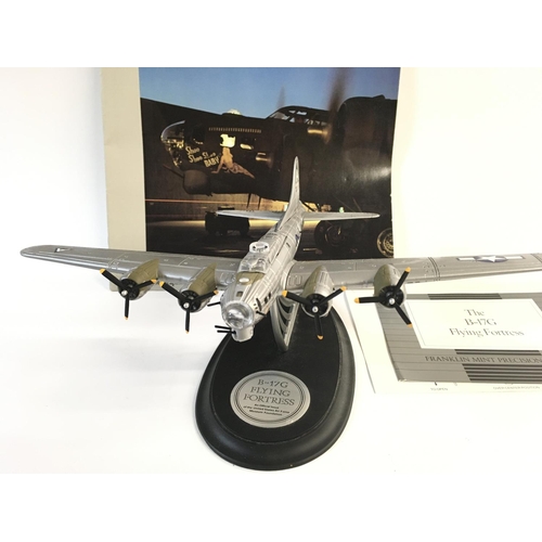 2143 - A Franklin mint die cast model of the B-17G Flying Fortress with paperwork. Postage B