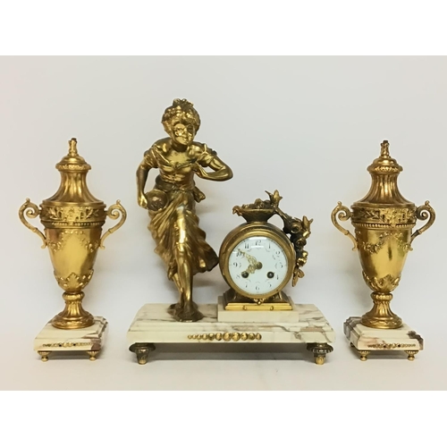 616 - Marble and Brass Clock garniture, with a mounted brass figure of a girl and floral decoration. posta... 