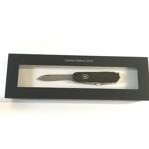 655 - A Victorinox pocket tool with damask blade. Limited Edition in 2011. Postage B