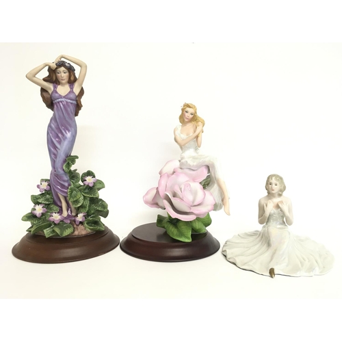 801 - A collection of porcelain figures including a Royal Dux Bohemian Art Deco Lady, Franklin Mint Lady V... 