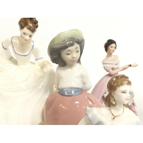 802 - A collection of Porcelain figurines including Neo & Royal Doulton, no obvious damage or restoration.... 