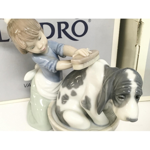 804 - A collection of boxed Lladro porcelain Dog figurines , no obvious damage or restoration. Postage cat... 