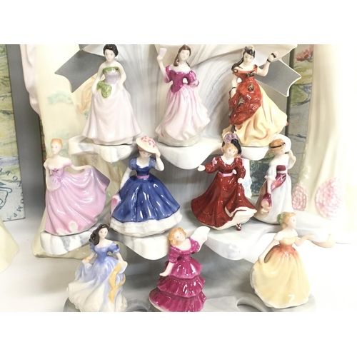 807 - A collection of boxed Royal Doulton Impressions porcelain figures and boxed Tiny Royal Doulton Ladie... 