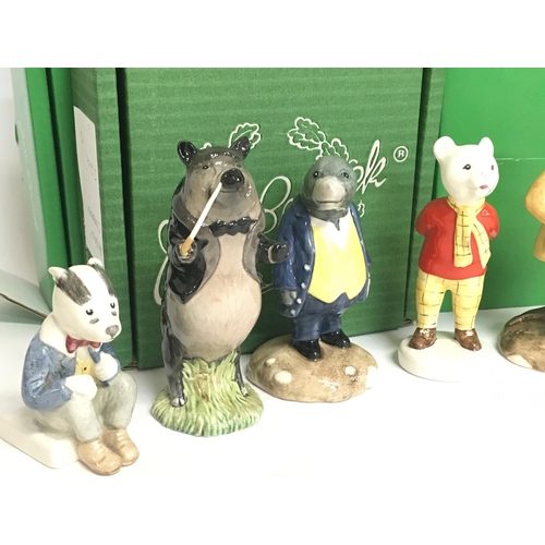 815 - Boxed Beswick figures including Bill Badger, Rupert the Bear, Ratty, Rupert with satchel. Postage ca... 