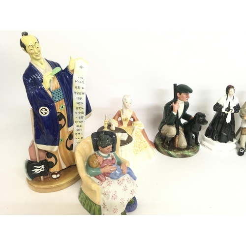 843 - A collection of Royal Doulton Porcelain figures including Bedtime story HN2059, The Family Album HN2... 