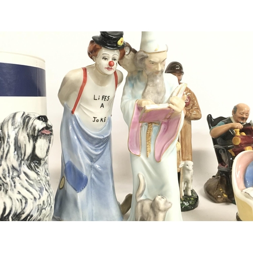 844 - A collection of Royal Doulton Porcelain figures including The Lobster Man HN2323, Joan HN2023, Dulux... 