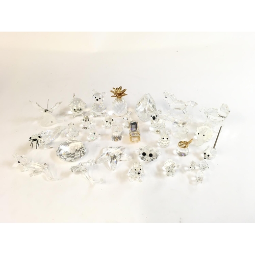 851 - A large collection of Swarovski silver crystal figures as pictured, containing trains, animals, Chri... 