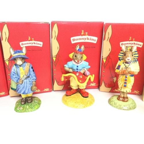 852 - A collection of boxed Royal Doulton Bunnykins figures including Clarissa the clown, Girl Guide, Scou... 