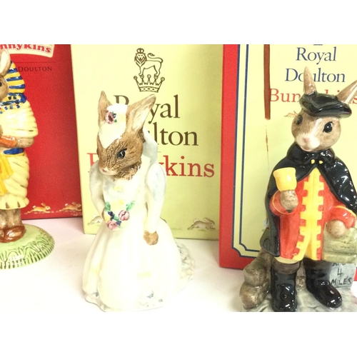 852 - A collection of boxed Royal Doulton Bunnykins figures including Clarissa the clown, Girl Guide, Scou... 