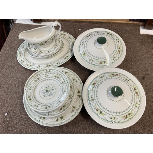 855 - A Doulton Provencal dinner set featuring plates, bowls etc. postage cat D