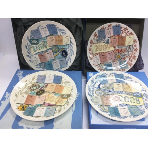 873 - A collection of boxed and loose Wedgwood calendar plates. Shipping category D.