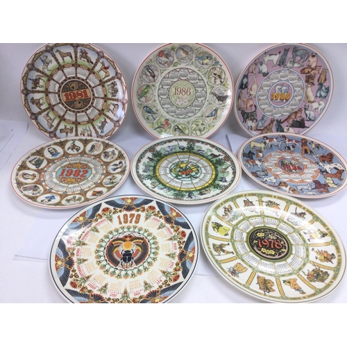 873 - A collection of boxed and loose Wedgwood calendar plates. Shipping category D.