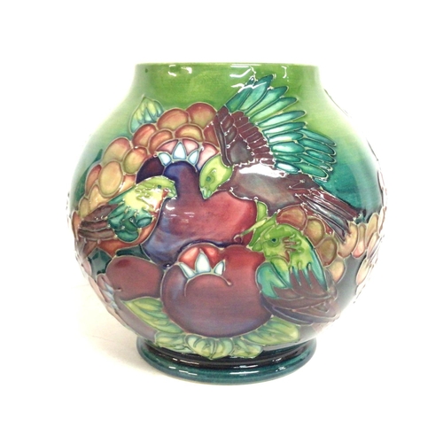 899 - Moorcroft vase decorated with birds and flowers, postage category D