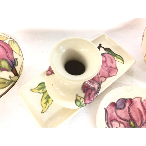 901 - A collection of Moorcroft ivory with pink hibiscus porcelain. Some damage Postage category D