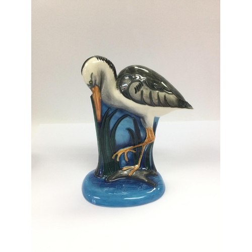 908 - A Moorcroft sculpture of a heron, signed to base, approx 18cm. Shipping category D.