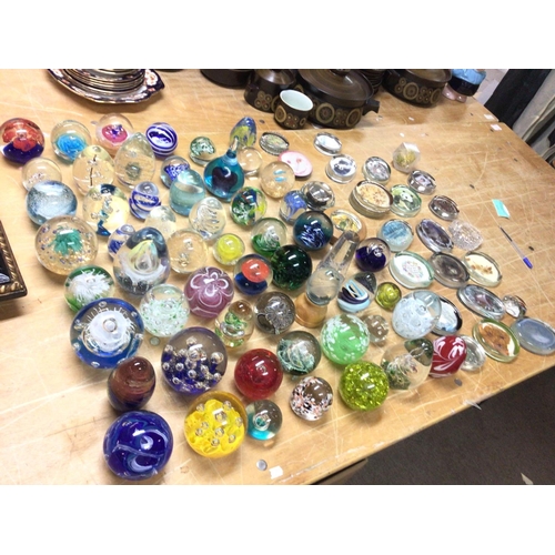 919 - A large collection of various paperweights