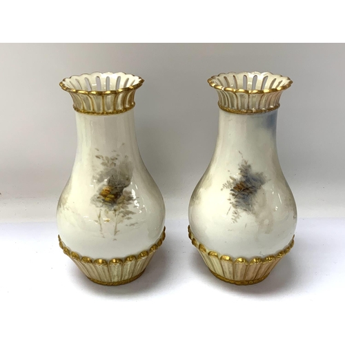 945 - A matching pair of Royal Worcester pierced rim Pheasant vases, painted by JAS Stinton. 13.5cm (Resto... 