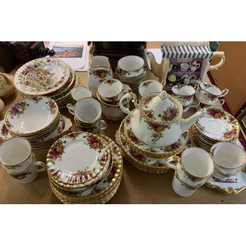 950 - A large collection of mixed Royal Albert country Roses tea china (all second quality). D.