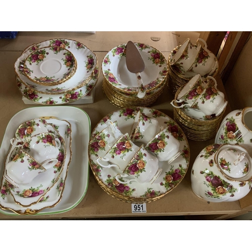 951 - A collection of Royal Albert Country Roses dinner and tea china. 1st Quality (D)