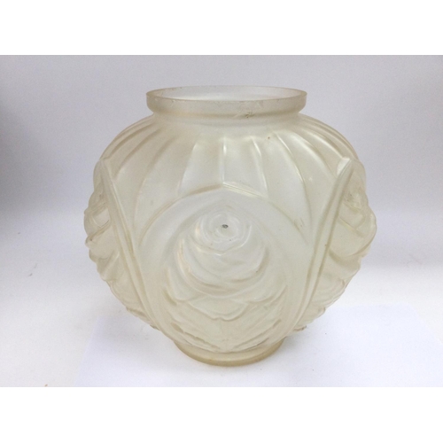 973 - An Art Deco glass vase of ovoid form with raised floral repeating decoration, approx height 20.5cm. ... 