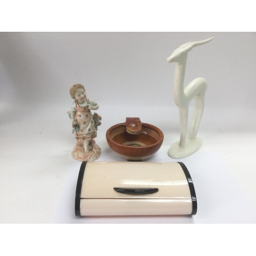 974 - A German porcelain figure of a girl, Art Deco animal figure, a Grays pottery ashtray and an Art Deco... 