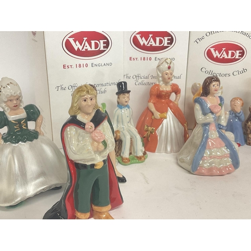 985 - A collection of boxed Wade figures including Beauty & the beast, Peter Pan and Cinderella porcelain ... 