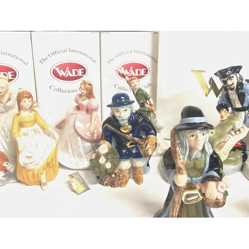 985 - A collection of boxed Wade figures including Beauty & the beast, Peter Pan and Cinderella porcelain ... 