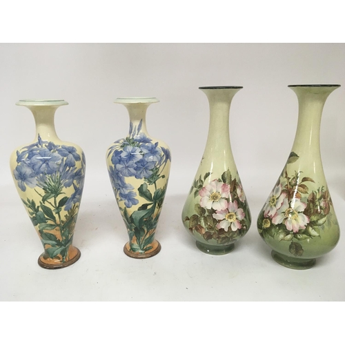 992 - Two pairs of of hand painted Lambeth Doulton vases with flowers and foliage signed bases Hight 28cm ... 