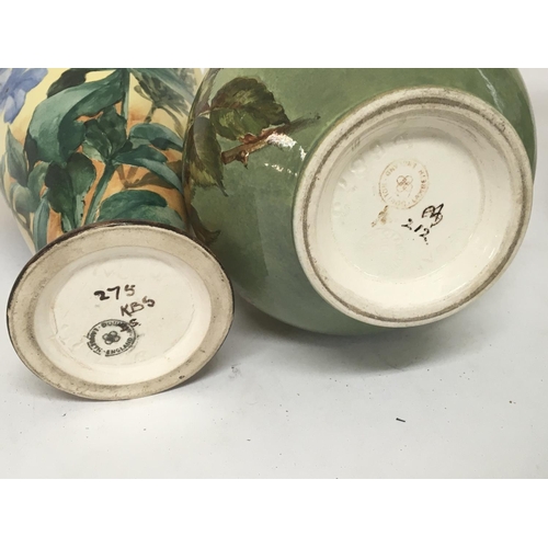 992 - Two pairs of of hand painted Lambeth Doulton vases with flowers and foliage signed bases Hight 28cm ... 