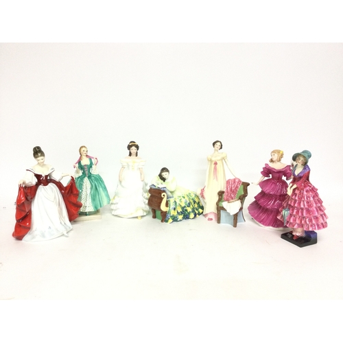 991 - A collection of Royal Doulton ceramic figures