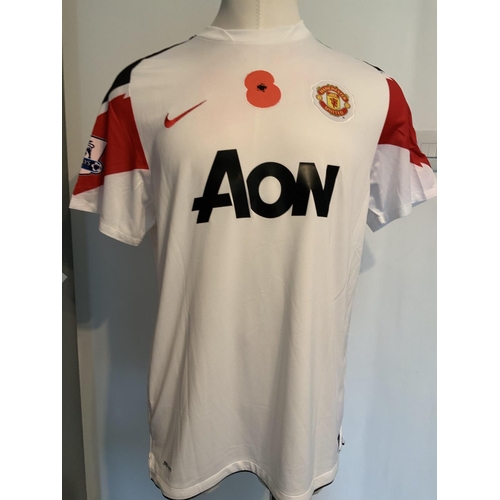 1146 - Smalling 2010 - 2011 Manchester United Match Worn Poppy Shirt: White number 12 short sleeve with Pop... 