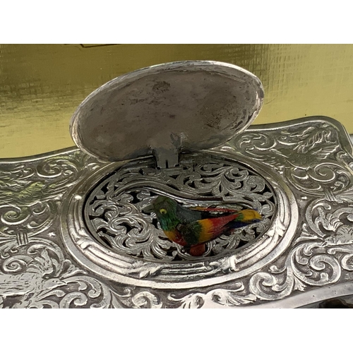 1000 - An ornate Swiss white metal ''Singing Bird'' automaton music box, stamped ''METAL'' and ''EB'' in an... 