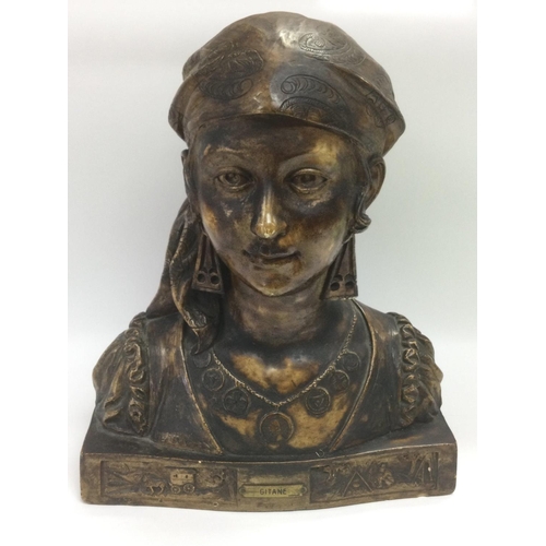 1005 - A plaster bust of a young gypsy woman raised on a plinth with plaque reading 'Gitane' and traditiona... 