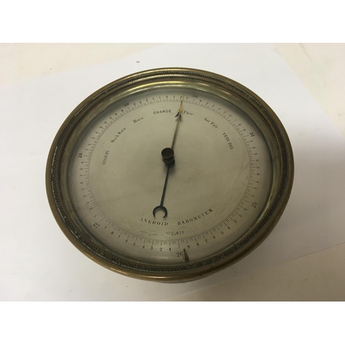 1014 - An Early 20th century brass barometer with a silvered dial attributed to Dent of London serial numbe... 