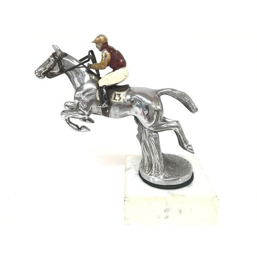 1019 - Chrome car mascot circa 1950s of a show jumping horse and rider mounted on a marble base, 15Cm tall.... 